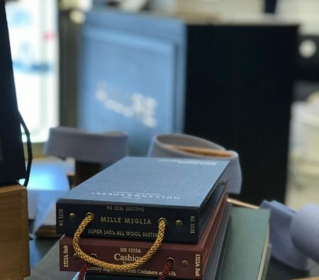 Premium suit fabric collection for bespoke tailoring at The White Stripes Tailors and Shirtmakers Dubai